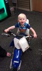 my boy picking out a bike at 1 yr old.
