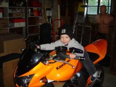 My youngest nephew. First time on a bike and he knew exactly what to do. He grabbed the throttle and let it rip.