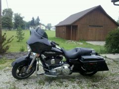 Hubby sold the VTX and went Harley. 
2010 hd street glide vivid black