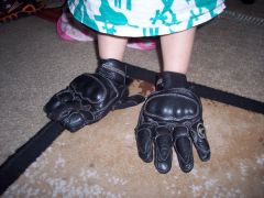 Wearing my MC gloves, they are her penguin feet.
