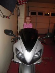 she loves daddy's bike.