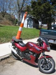my bike before every thing was ripped off. It might be hard to tell but there was a lot of damage to the plastics from previous owners.  As for the orange cone......... my neighbors/ drunk idiots are dicks