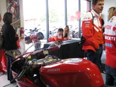 Nori Haga signing swag at the local Ducati dealership