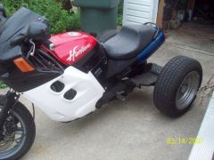 Still needs work maybe some luggage around the back like a goldwing? oh and fenders! Ridden often to work and back.