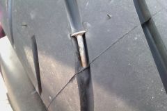 Nail embedded in my brand new tire...