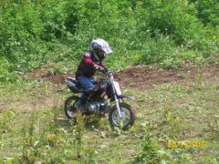 Sabastian learning to ride the berm