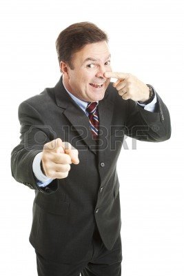 9077723-businessman-points-to-you-and-touches-his-nose--the-symbol-for-you-re-right--isolated-on-white.jpg
